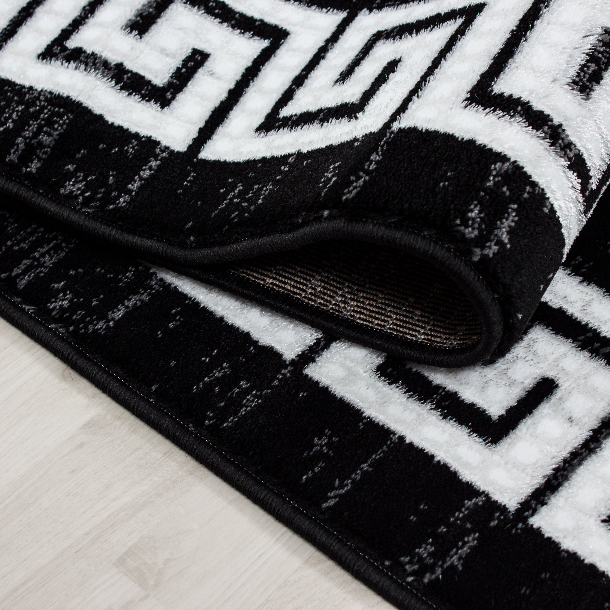 Zwart Tapijt Laagpolig Vloerkleed Omid Curve - Omid Carpets