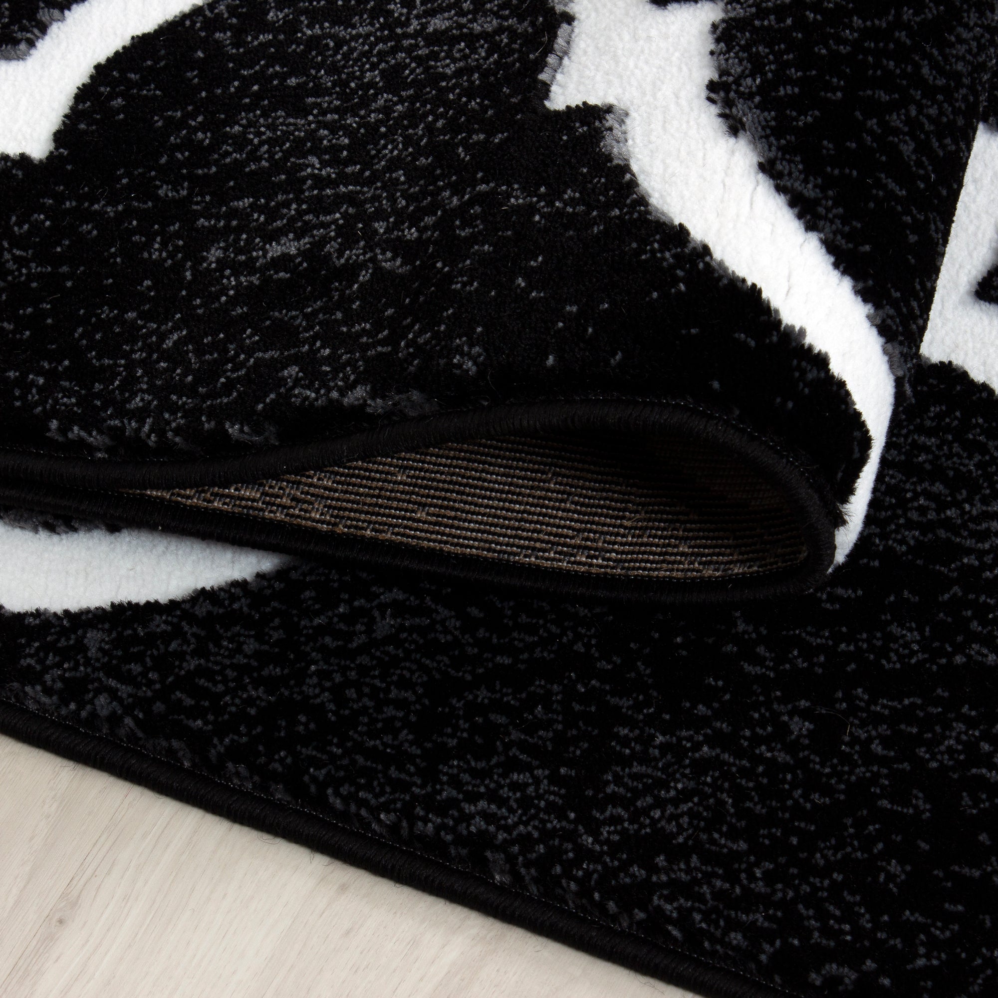 Zwart Tapijt Laagpolig Vloerkleed Omid Curve - Omid Carpets