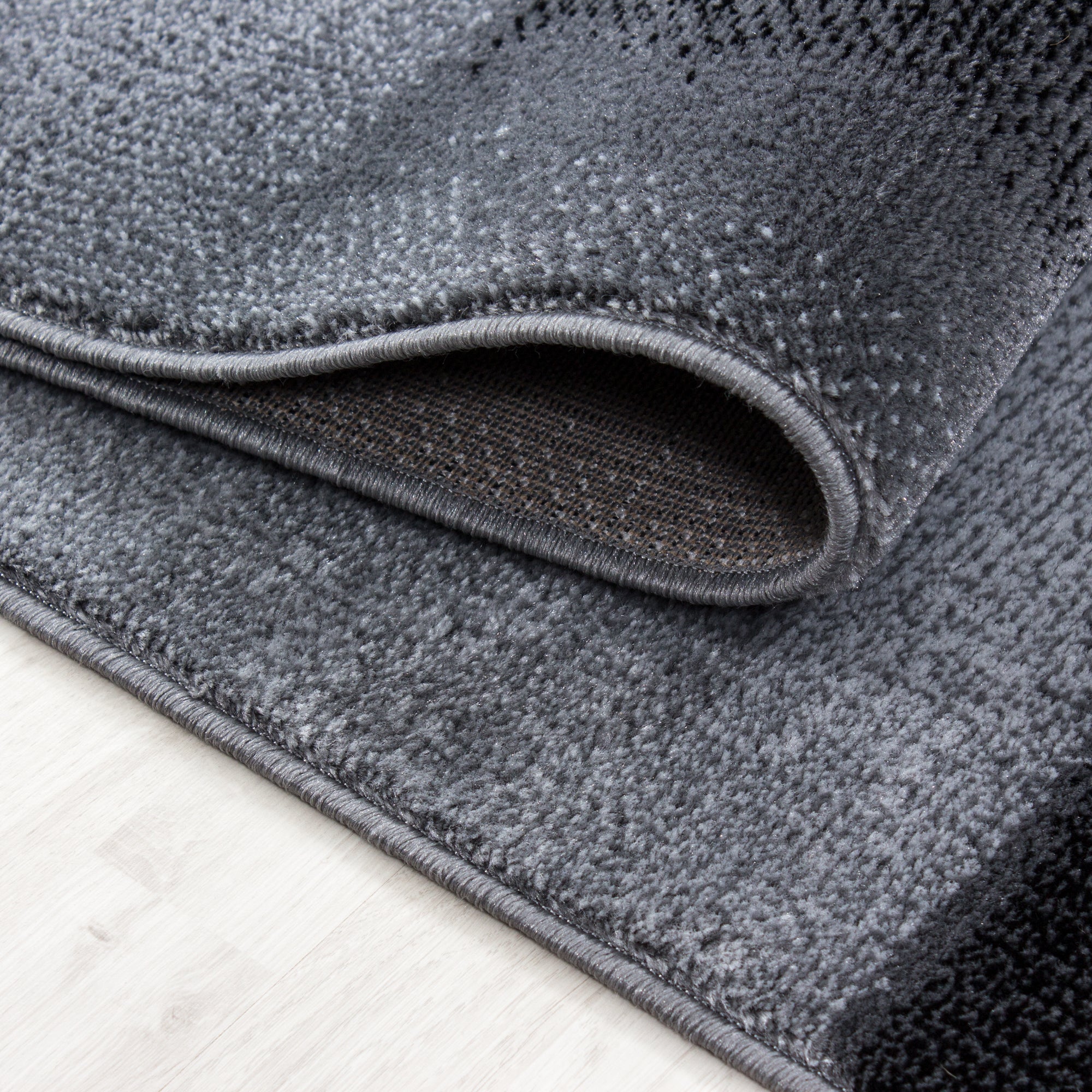 Zwart Tapijt Laagpolig Vloerkleed Omid Run - Omid Carpets