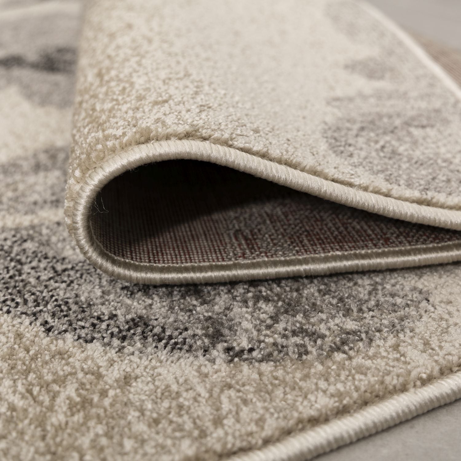 Beige met Grijs Tapijt Laagpolig Vloerkleed Omid Belgian Design Bloemenpatroon
